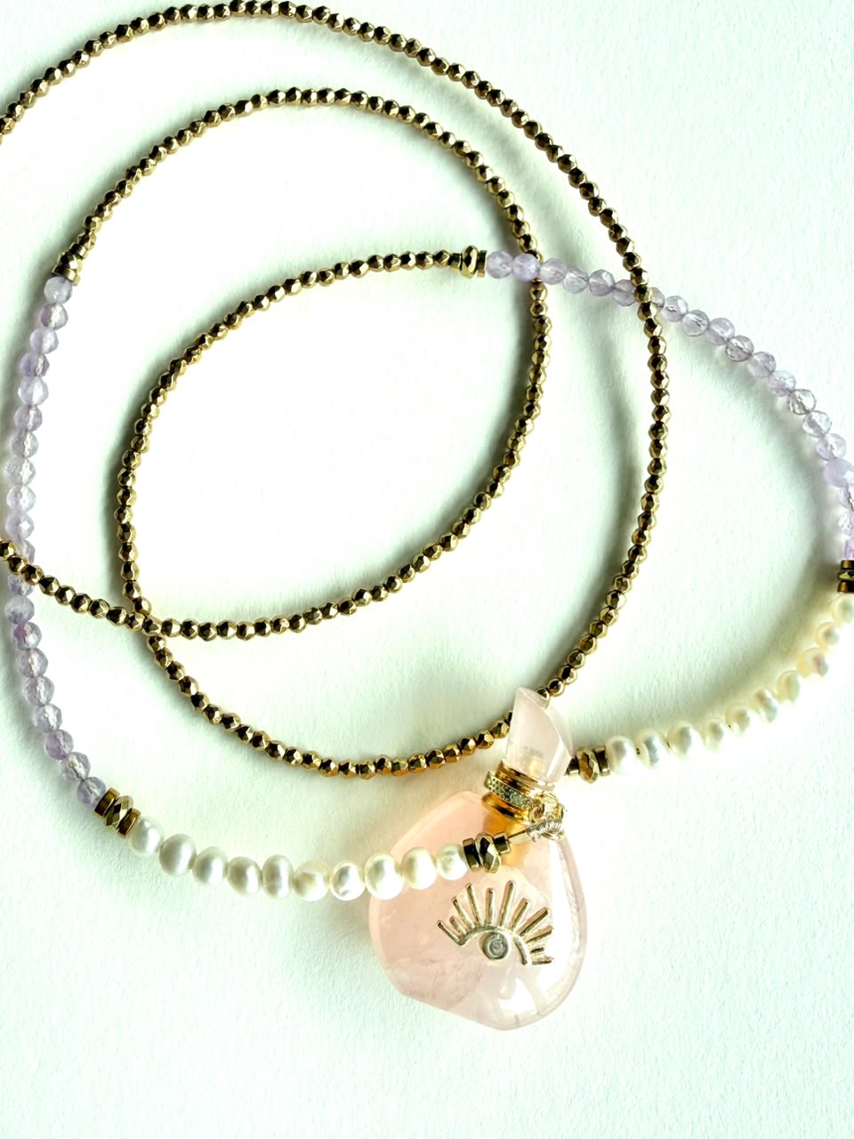 Rose Quartz Potion Bottle Pendant with Gold Hematite